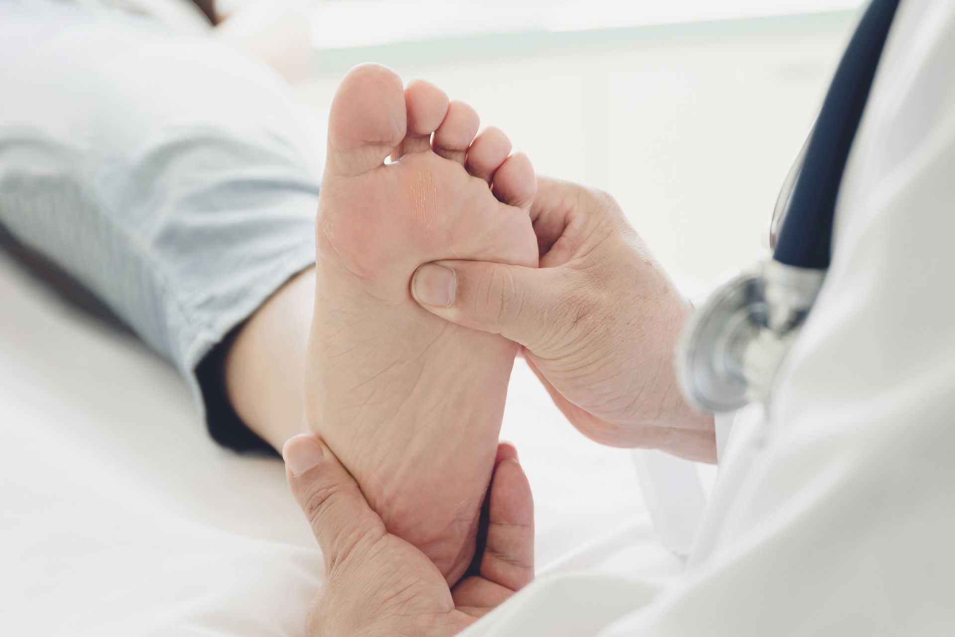Podiatrist treating a patient at Footprint Podiatry